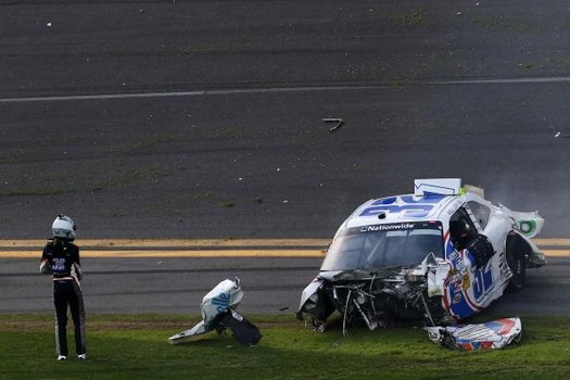 DAYTONA BEACH, FL - FEBRUARY 23:  Kyle Larson, driver of the #32 Clorox Chevrolet, gets out of his car following an incident at the finish of the NASCAR Nationwide Series DRIVE4COPD 300 at Daytona International Speedway on February 23, 2013 in Daytona Beach, Florida.  (Photo by Matthew Stockman/Getty Images)