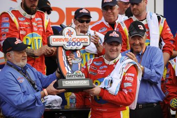 Feb 23, 2013; Daytona Beach, FL, USA; NASCAR Nationwide Series driver Tony Stewart celebrates in victory lane after winning the DRIVE4COPD 300 at Daytona International Speedway. Mandatory Credit: Kevin Liles-USA TODAY Sports