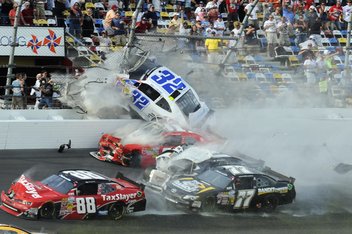 Kyle Larson's #32 Hits The Catch Fence